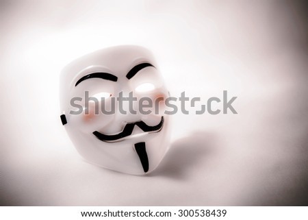 white anonymous mask on white background