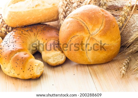 The various bakery products on wooden background