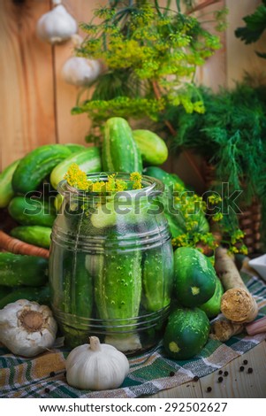 Jar of pickles and other ingredients for pickling