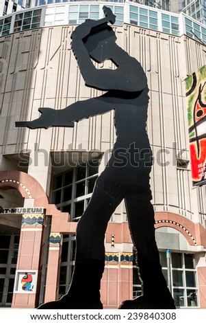 SEATTLE, WA/USA - April 1, 2014: Appearing as a shadow against the building, \