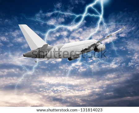 Passenger airplane flying above sea on stormy sky with dark clouds and lightnings.