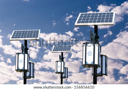 Solar photovoltaic powered lamp posts on the blue skies with sun