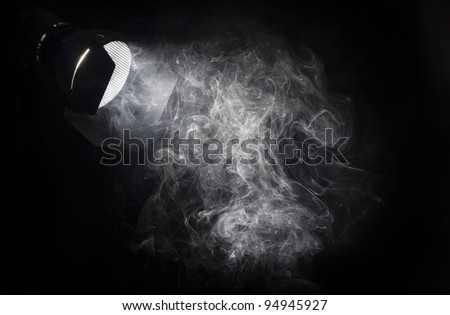 stock-photo-vintage-theater-white-spot-light-beam-from-projector-on-black-background-illuminating-smoke-barn-94945927.jpg