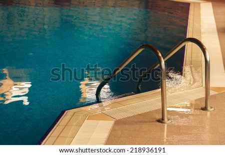Relaxing swimming pool with clean water at spa