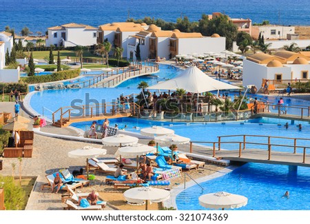 KARDAMENA, KOS/GREECE - July 29, 2015: Part of the Mitsis Blue Domes resort with salty water pools and a big pool bar.