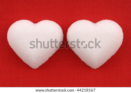 Heart Candy on red cotton