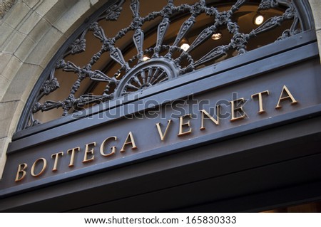 Florence, ITALY - December 8, 2011: Bottega Veneta Florence Store Logo Italy mounted on the marble wall of Bottega Veneta Store at Via de\' Tornabuoni,the heart of Florence high-class shopping district