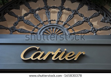 Florence, ITALY - December 8, 2011: Cartier Florence Store Logo Italy  mounted on the marble wall of Cartier Store at Via de\' Tornabuoni, the heart of Florence high-class shopping district
