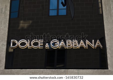 Florence,ITALY -December 8, 2011: Dolce + Gabbana Florence Store Logo Italy mounted on the marble wall of Dolce & Gabbana Store at Via de\' Tornabuoni,the heart of Florence high-class shopping district
