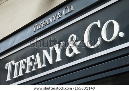 Florence, ITALY - December 8, 2011: Tiffany Florence Store Logo Italy mounted on the marble wall of Tiffany Store at Via de' Tornabuoni, the heart of Florence high-class shopping district