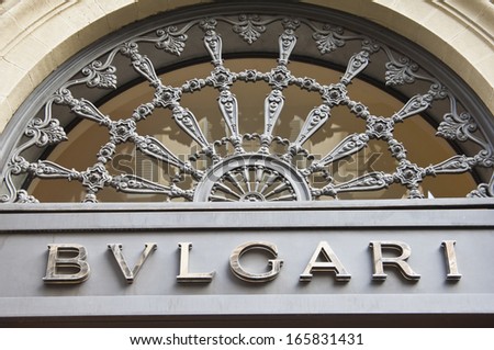 Florence, Italy - December 8, 2011: Bulgari Logo mounted on the marble wall of Bulgari Store at Via de' Tornabuoni, the heart of Florence high-class shopping district