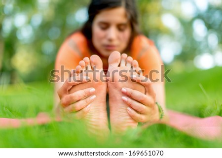 girl meditating and doing yoga at sunset