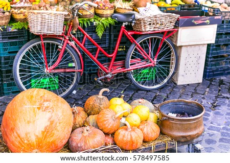 Local Fruit market with old bike and pumpkins in Campo di fiori ,Rome