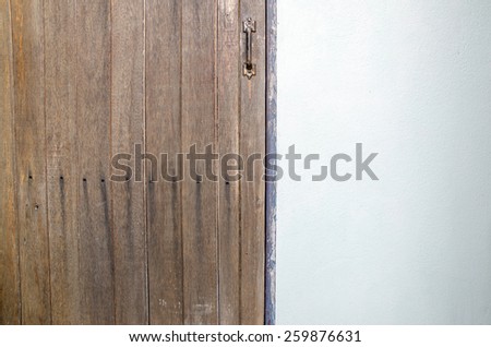 Old wooden door to the house door