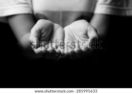 Black and white woman hands with palms up