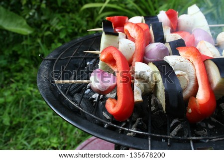 A grill for vegetarian kitchen in a backyard