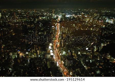 Tokyo by night with red light view from Mori Tower