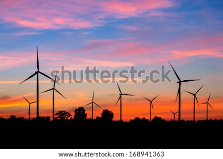 Wind turbine power generator at twilight Wind turbine power generator at twilight