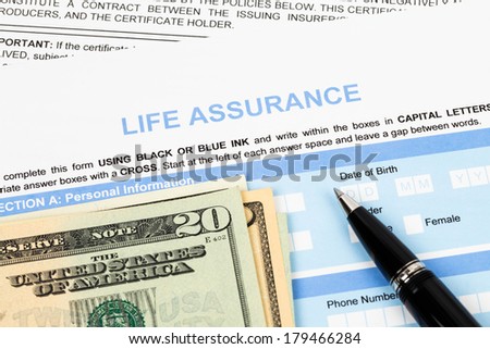 Life assurance application form with banknote and pen concept for life planning