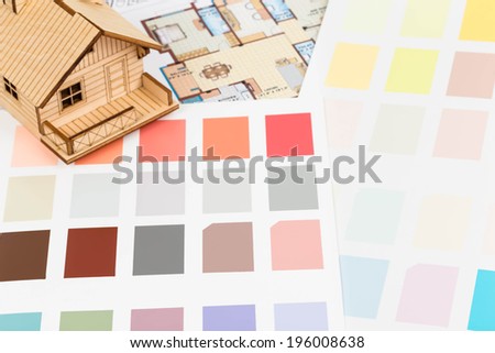 Paint color sample catalog with drawing, and house model