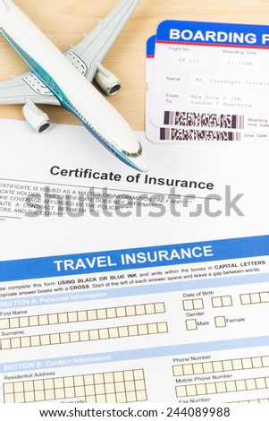 Travel insurance application form with plane model and boarding pass