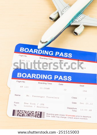 Boarding pass and plane model