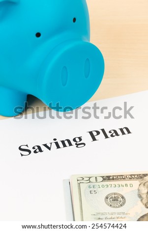 Saving plan with dollar banknote and piggy bank
