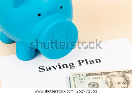 Saving plan with dollar banknote and piggy bank