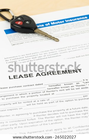 Lease agreement with car key; document is mock-up
