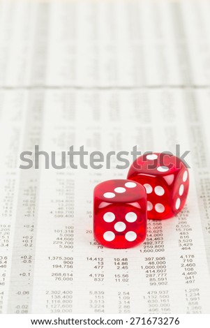 Dice rest on stock price detail financial newspaper
