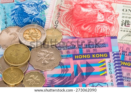 Hong Kong dollar money banknote close-up with coins