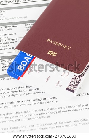 Passport and travel document; e-ticket and boarding pass, information are mock-up