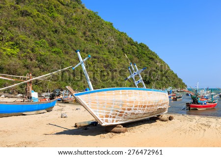 Repair boat on beach,  fisherman village near Hua Hin, Thailand