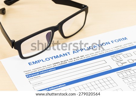 Employment application form with glasses concept job applying