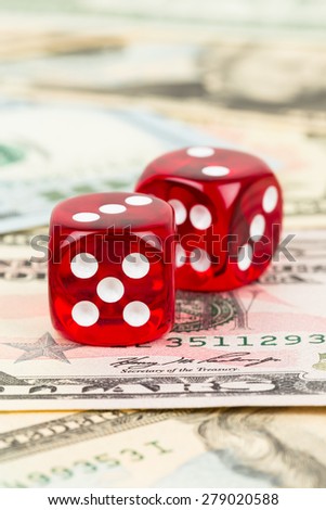 Two dice and dollar bank note concept for risk in investment