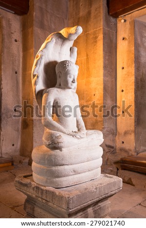 Nakorn Ratchasima, Thailand - Aug 9, 2014: White stone carving buddha in Pimai castle