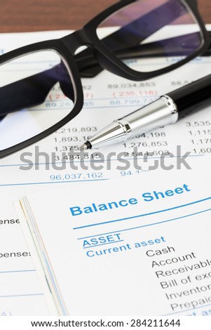 Balance sheet in stockholder report book, balance sheet is mock-up