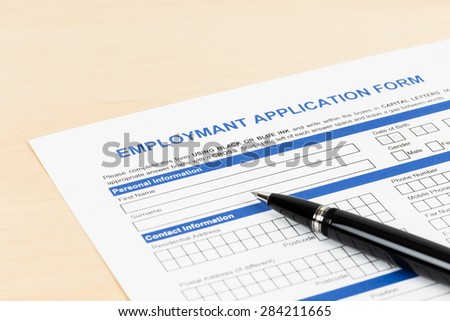 Employment application form with pen concept job applying
