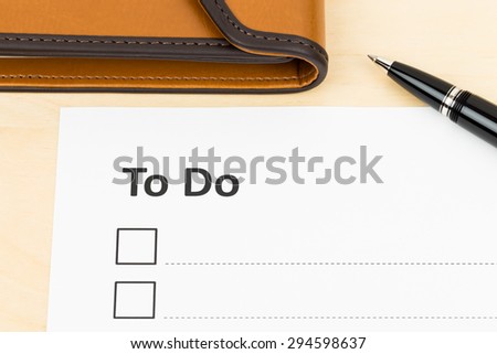 Blank to do list with pen and organizer