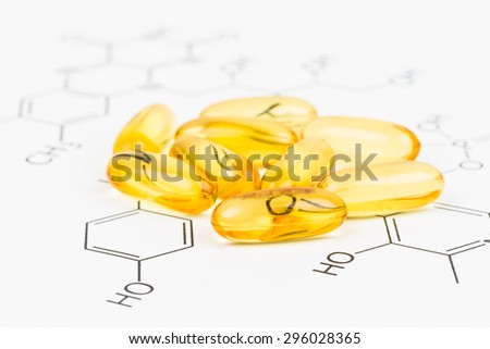 Fish oil capsule food supplement on vitamin formula