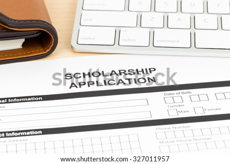 Scholarship application form with keyboard