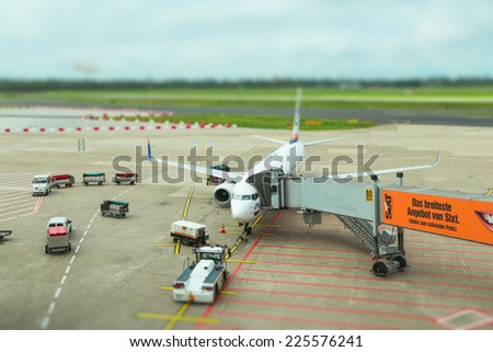 Airport in Dusseldorf, Germany - 21 september 2014: Plane is getting ready to flight.  The 3d largest airport in Germany after Frankfurt and Munich airports,handling 20.8 million passengers in 2012.