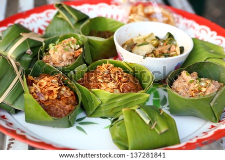 thai food with banaba leaf pack