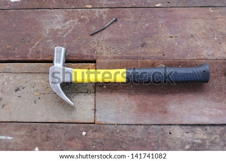 hammer on wooden floor