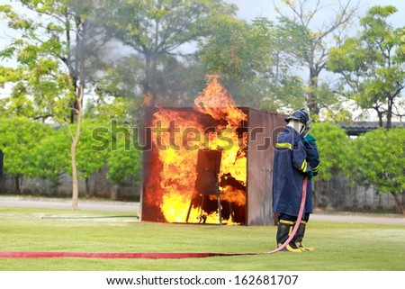Firefighter fighting for fire attack training