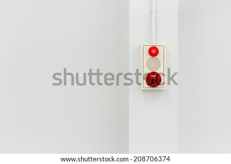 fire alarm on white wall