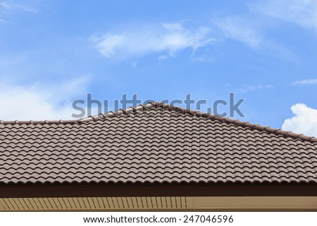 roof under construction with stacks of roof tiles for home building