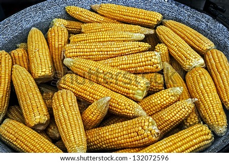 Corn boiled in a large pot, at a fair with traditional romanian food.