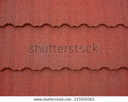Colored asphalt roof structure that mimics the tiles.