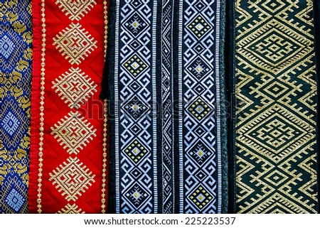 Wide belts, and embroidered Romanian traditional.